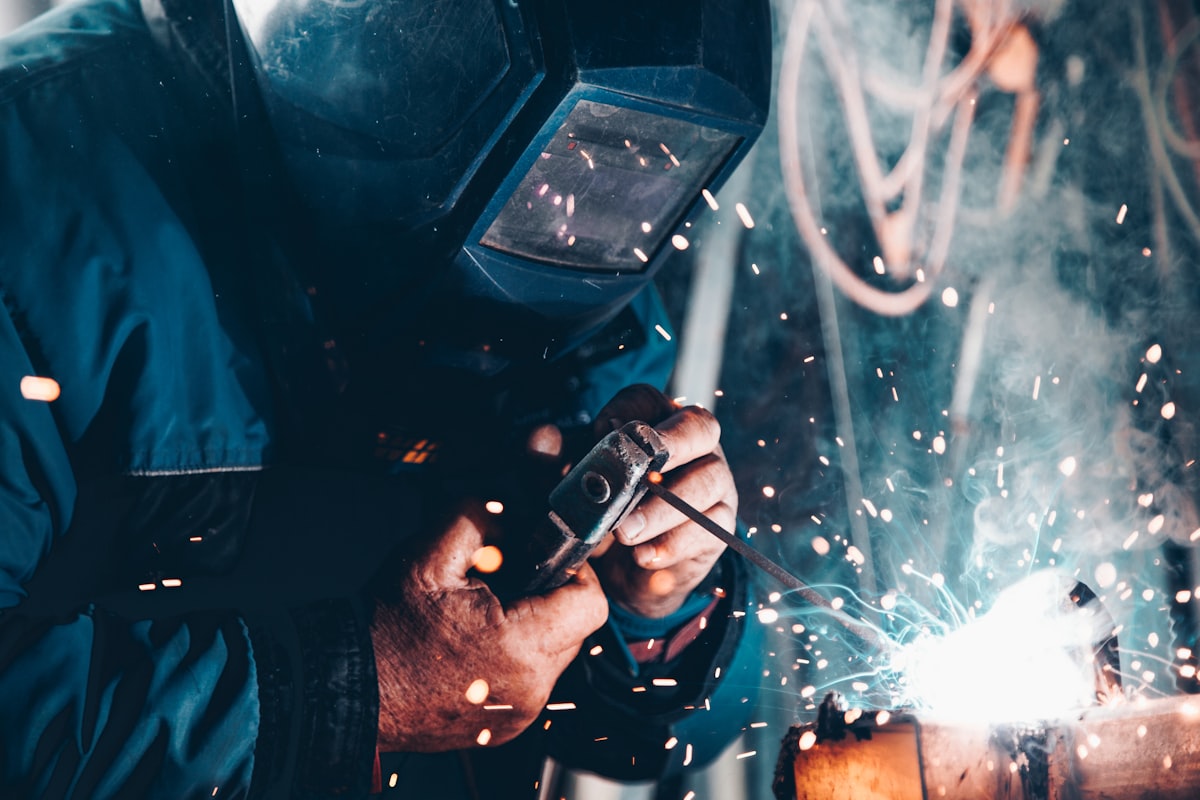 Technician working on equipment in black and white